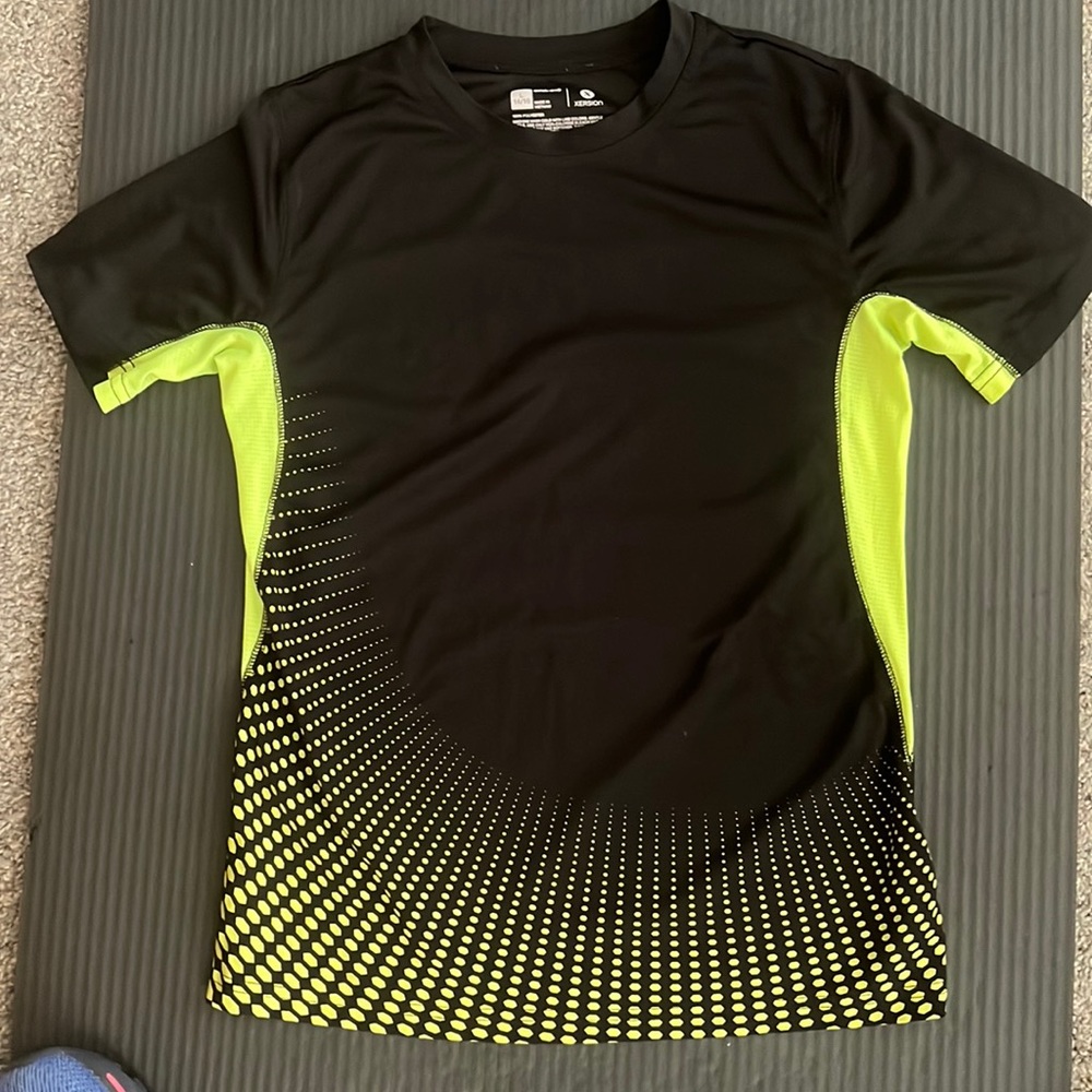 Xersion’s black and yellow shirt